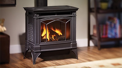 Large freestanding gas stove with a standing pilot light. Transform a room with this beautiful cast iron direct vent gas stove which is available in three finishes.